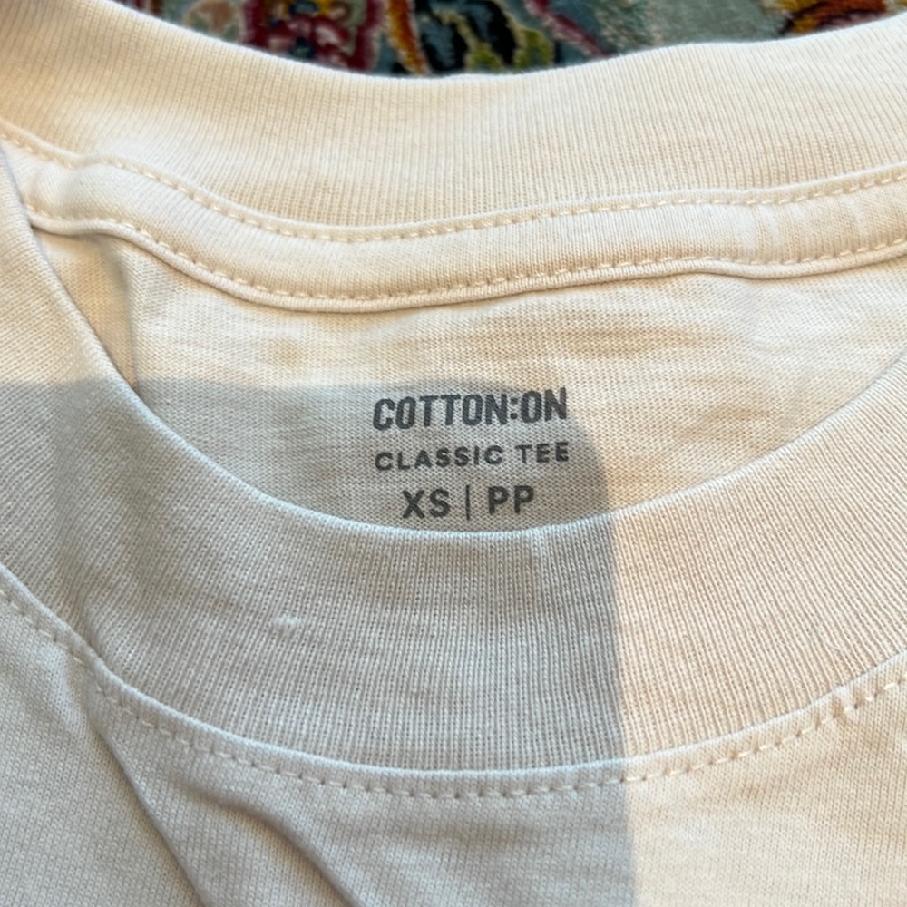 Cotton on xs t shirt - never worn before. Clean and new